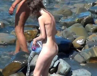 Beach spycam demonstrates us some bare teenager nudists. Go