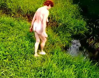 French grandma nudist swimming in the lake
