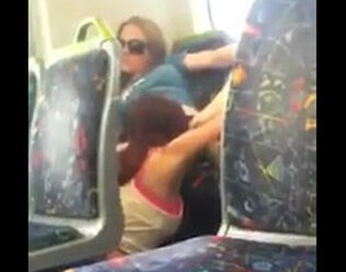 Dissolute nymph eating out her mate on public transport